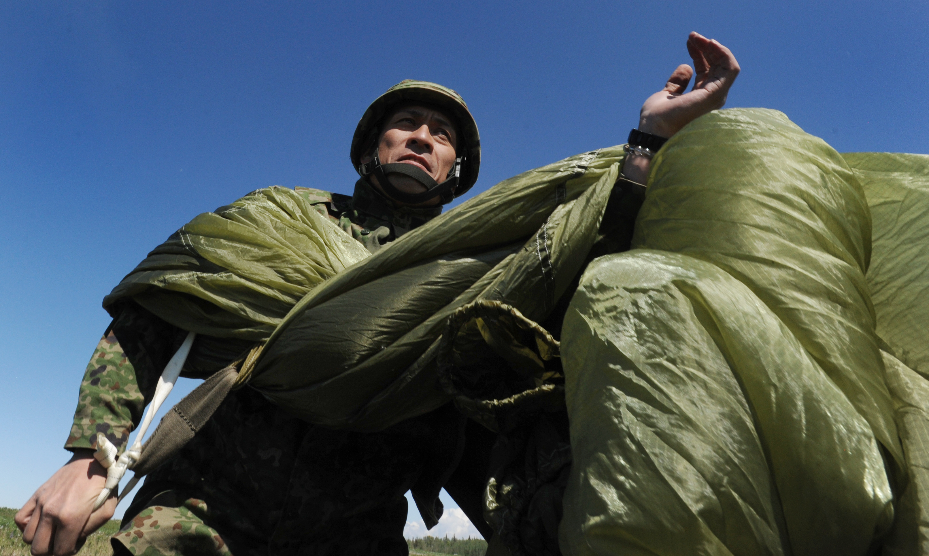 U.S. Army Alaska and Japanese paratroopers jump together on JBER