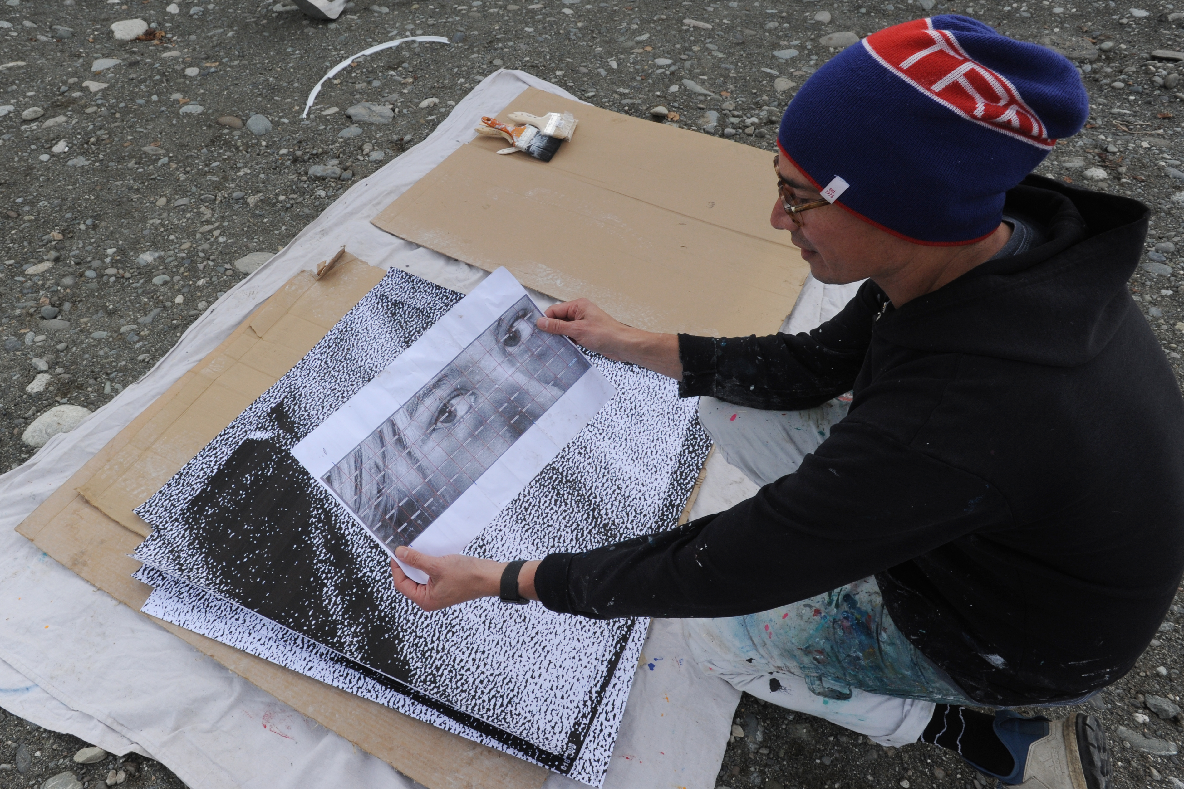A giant new Spenard mural gazes over a storied, troubled corner
